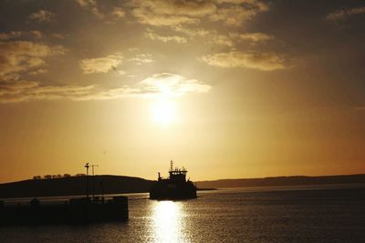 Scenic view of sea at sunset