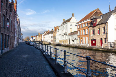 Canal passing through buildings in town