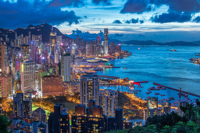 Aerial view of illuminated city buildings