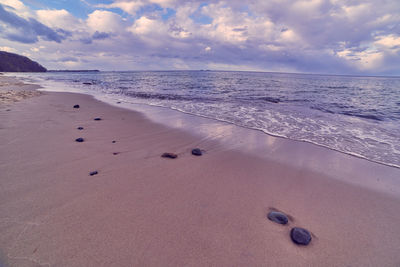 Scenic view of beach against sky