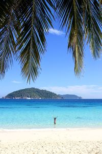 Scenic view of sea against blue sky