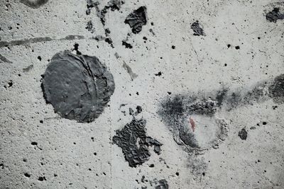 Close-up of footprints on sand