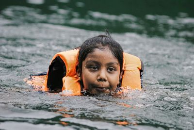 Portrait of girl in swimming pool