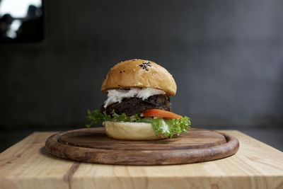 Close-up of burger on cutting board