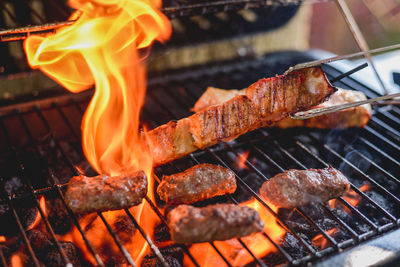 Close-up of meat on barbecue grill