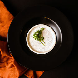 High angle view of coffee cup on table