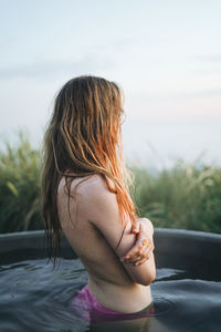 Side view of young woman in spa