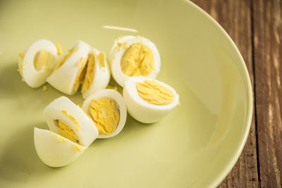 High angle view of lemon served in bowl on table