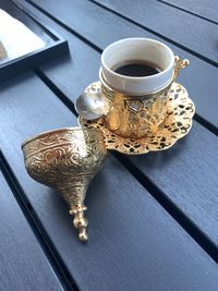 High angle view of coffee cup on table