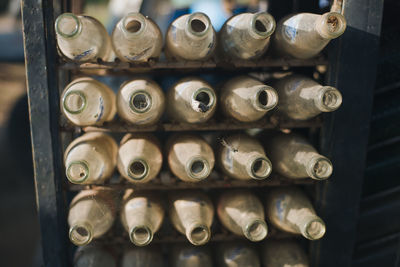Full frame shot of bottles in container