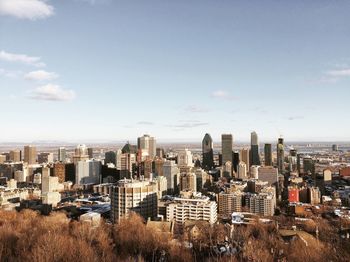 High angle shot of cityscape against sky