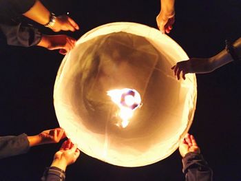 People holding balloon