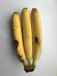 High angle view of bananas against white background