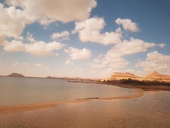 Scenic view of beach against sky