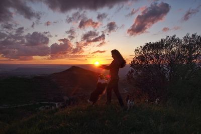 Scenic view of landscape at sunset