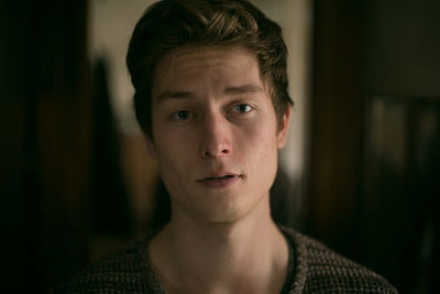 Close-up portrait of boy at home