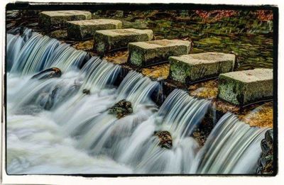 Stream flowing through rocks