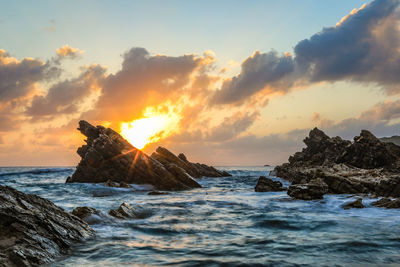 Scenic view of sea against sky during sunset