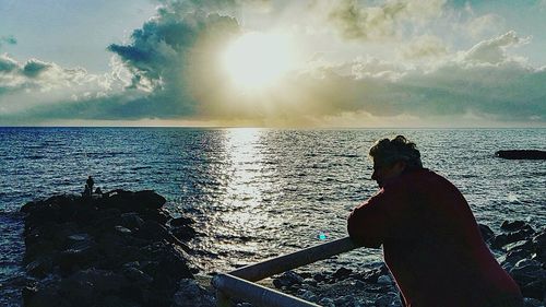 Scenic view of sea at sunset