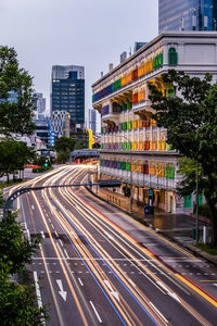 High angle view of light trails on road in city