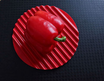 High angle view of red chili peppers on table
