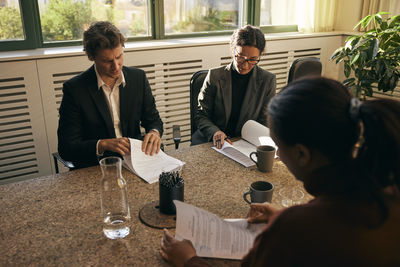 Side view of man working at home