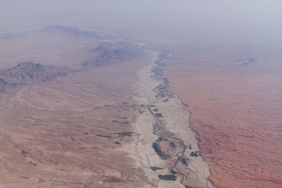 Aerial view of snow covered land