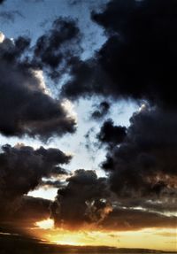 Low angle view of cloudy sky during sunset