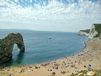 High angle view of tourists on beach