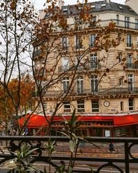 View of buildings against cloudy sky