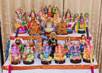 Various figurines for sale at market stall