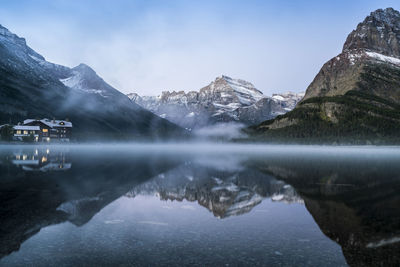 Scenic view of lake with mountains in background