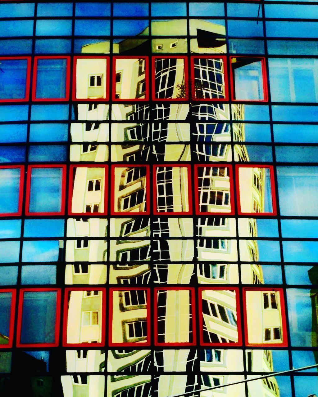 FULL FRAME SHOT OF BUILDING WITH REFLECTION