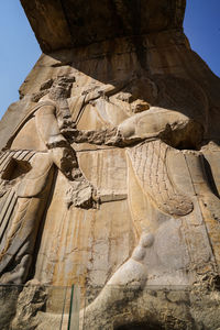 Low angle view of statue  at persepolis