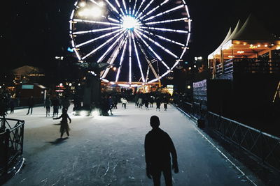 People in city at night