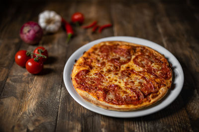 High angle view of pizza on table