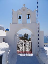 Entrance with bell towers at santorini