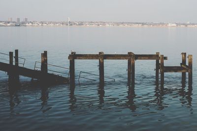 Pier on sea against sky