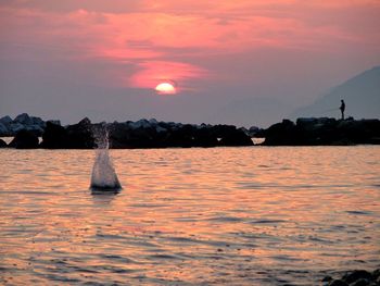 Scenic view of sea at sunset