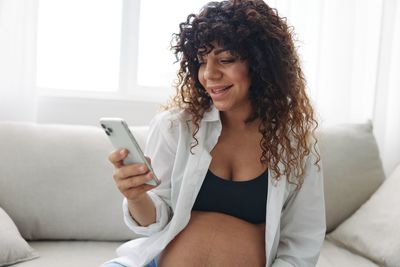 Young woman using mobile phone