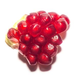 Close-up of raspberries against white background