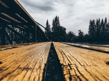 Surface level of bridge against sky