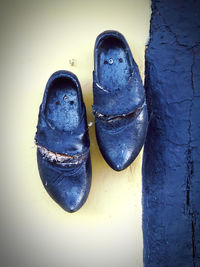 High angle view of shoes on wall