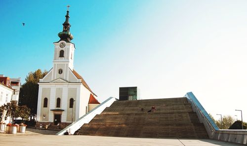 Low angle view of stairs against clear sky