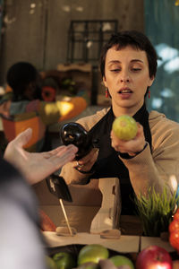 Portrait of boy eating food at home