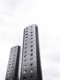 Low angle view of modern buildings against sky