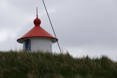 Traditional windmill on landscape