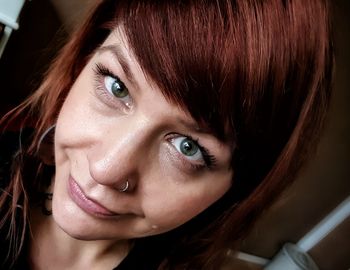 Close-up portrait of woman with brown hair