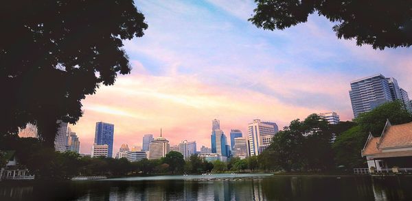 City by buildings against sky