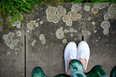 Low section of person standing on ground